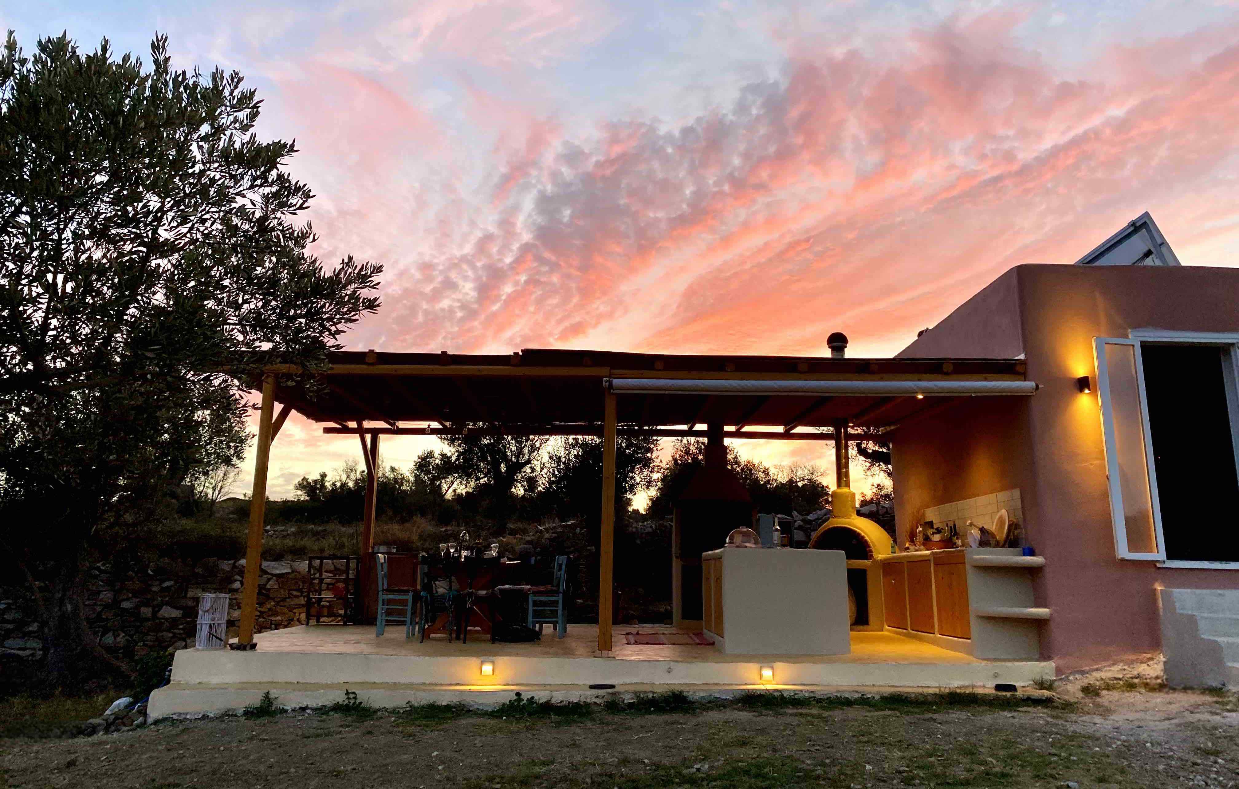 Sunset kitchen at the Naxos Cozy Nest, ideal place for private dinning, food & wine tasting, and yoga practice with healthy brunch